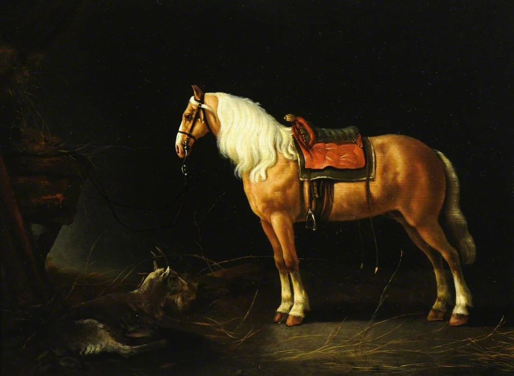 Un cavallo sellato con una capra in una stalla - National Trust